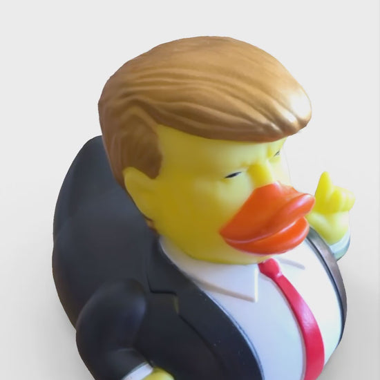 Young Trump Rubber Duck with golden hair and red tie 180

